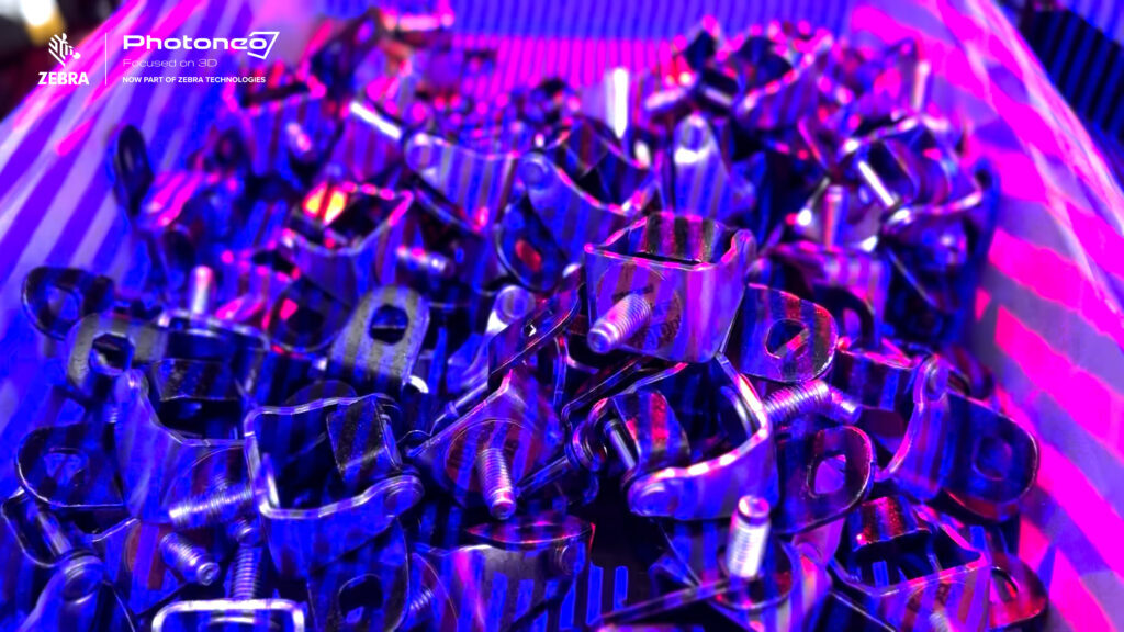 Structured light pattern of blue laser cast on the scanned scene